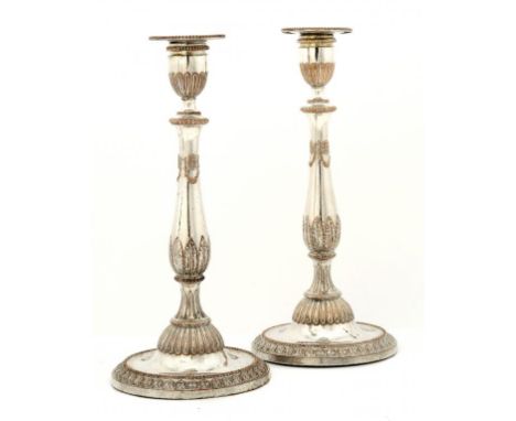 A PAIR OF SHEFFIELD PLATE NEO CLASSICAL CANDLESTICKS, C1778  29cm h, by Winter Parsons & Hall Illustrated: Crosskey, op cit, 