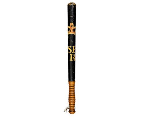 A VICTORIAN PAINTED WOOD SOUTH EASTERN RAILWAY TRUNCHEON painted in red and cream with crown and lettered SE/R on a black gro
