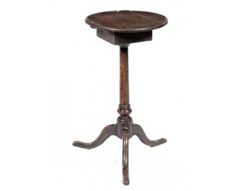 A GEORGE III PRIMITIVE OAK TRIPOD CANDLESTAND, 18TH C  64cm h, top 35cm diam ++Old damage and repairs, the top on curious squ