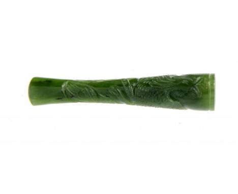 A CHINESE CARVED SPINACH JADE CIGARETTE HOLDER, 1920S/30S  7cm l ++In fine condition