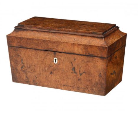 A GEORGE IV BURR MAPLE TEA CADDY, C1830  the fitted interior with pair of canisters and contemporary glass jar, 30cm w, brass