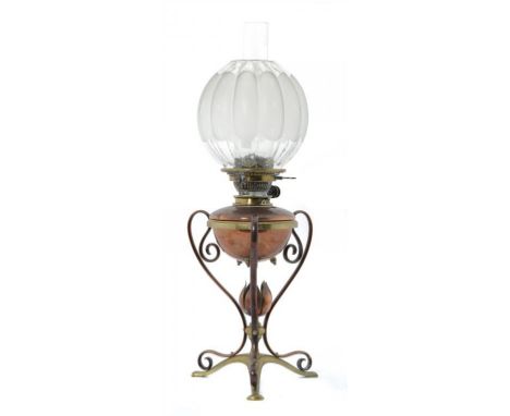 AN ARTS & CRAFTS BRASS AND COPPER OIL LAMP DESIGNED BY W A S BENSON AND MANUFACTURED BY W A S BENSON & CO, C1900  with Benson