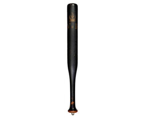 A VICTORIAN PAINTED WOOD TRUNCHEON painted in gold with crown and V*R   on a black ground, the handle retaining the original 