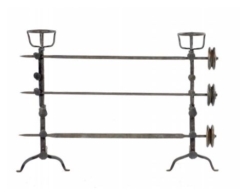 A PAIR OF WROUGHT IRON CRESSET FIRE DOGS,   18TH C  with spit racks and three iron spits, each with turned wood, possibly hor