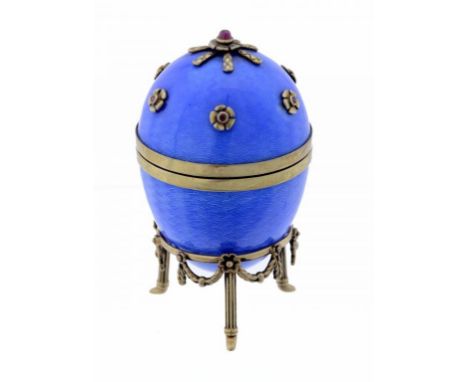 A VICTOR MAYER 'FABERGÉ' JEWELLED SILVER GILT MOUNTED BLUE GUILLOCHE ENAMEL EASTER EGG AND STAND, C1990  8.5cm h, maker's and