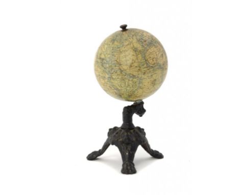 LEBÈGUE & CO (J), PARIS.  A 10CM TERRESTRIAL DESK GLOBE, C1900 inscribed TERRESTRIAL GLOVE J. L. & CO PARIS on short cast iro