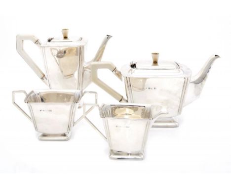 A GEORGE VI SILVER TEA AND COFFEE SERVICE the pots with ivory handle and knop, coffee pot 18.5cm h, by Britton, Gould & Co, B