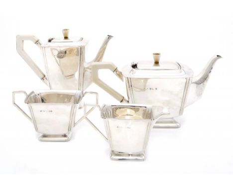 A GEORGE VI SILVER TEA AND COFFEE SERVICE the pots with ivory handle and knop, coffee pot 18.5cm h, by Britton, Gould & Co, B