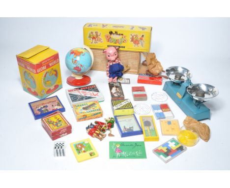 Assorted children's pocket sized puzzles and games, Pelham Puppet, Chad Valley globe and other interesting vintage toys as sh