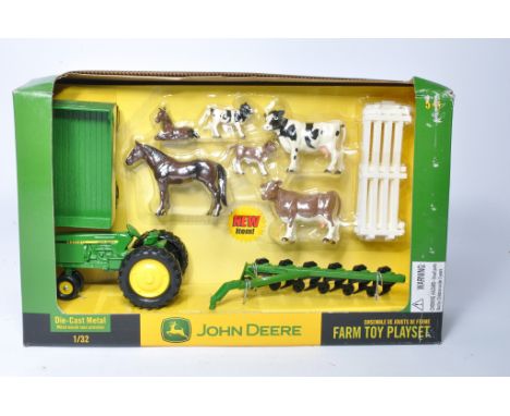 Ertl 1/32 diecast farm model issue comprising John Deere Tractor Playset. Excellent in box, box does have storage wear. 