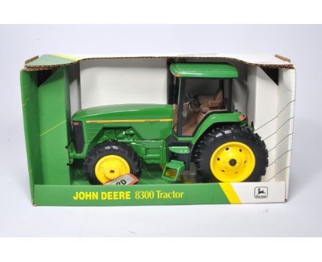 Ertl 1/16 diecast farm model issue comprising a John Deere 8300 Tractor. No obvious sign of major fault, contained in origina
