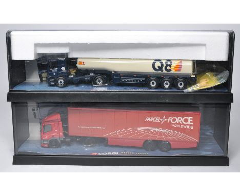 Corgi 1/50 diecast model truck duo comprising tractor trailer combinations in liveries of Q8 Fuels and Parcel Force. Both loo