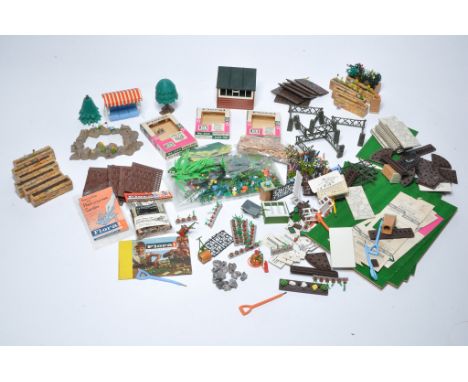 A quantity of Britains plastic miniature garden comprising plants / flowers, pots, lawn sections, buildings, tools, decorativ