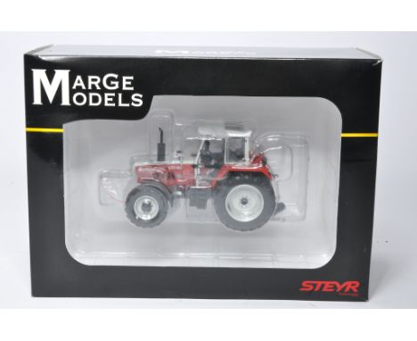 Marge Models 1/32 diecast farm model issue comprising Steyr 8130 SK2 4WD Tractor. Unopened hence excellent with no obvious si