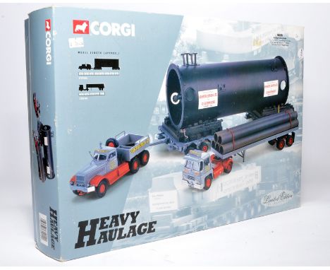 Corgi 1/50 diecast model truck comprising Heavy Haulage issue 31014 Guy Invincible Long Platform Trailer, Pipe Load &amp; Dia
