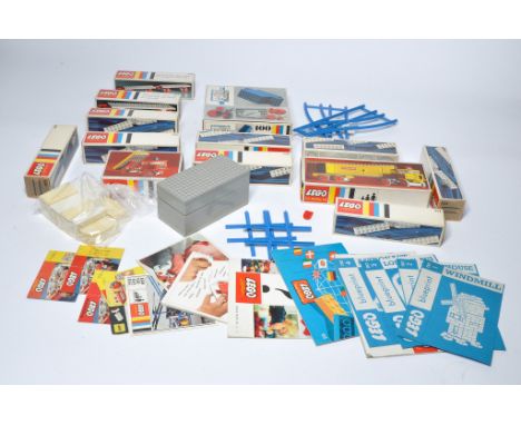 An impressive collection of vintage Lego to include various older issue sets, leaflets, instructions etc plus loose parts and