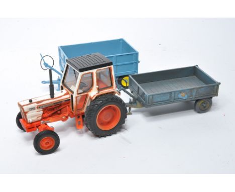 Trio of 1/32 farm models including Britains David Brown Tractor plus duo of Weeks' tipping trailers. One has been weathered a
