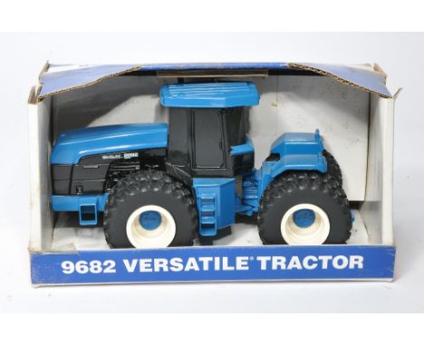 Ertl 1/32 diecast farm model issue comprising New Holland Versatile 9682 Tractor. No obvious sign of fault, in original packa