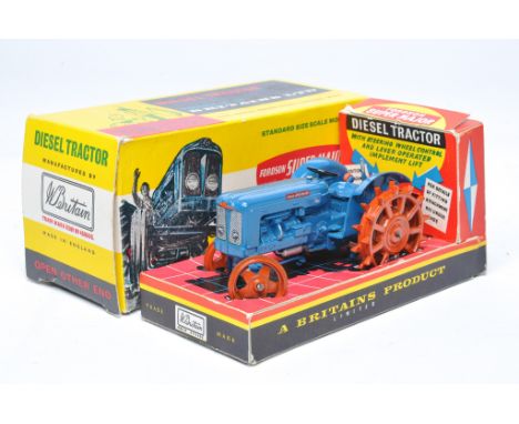 Britains 1/32 Vintage Farm issue comprising No. 171F Fordson Super Major Tractor with Metal Wheels. Second version without si