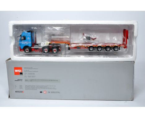 WSI 1/50 diecast model truck issue comprising Volvo FH3 Step Frame Trailer in the livery of C J Leonard. Looks to be without 