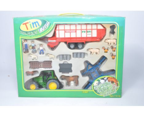 Tim Toys 1/32 diecast farm model issue comprising John Deere Tractor and Implement Set. Excellent in box. 