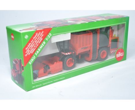 Siku 1/32 diecast farm model issue comprising Terra Dos Sugarbeet Harvester. Excellent and secure in box. 