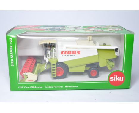 Siku 1/32 farm model issue comprising Claas Lexion 480 Combine Harvester. Excellent and secure in original box. 