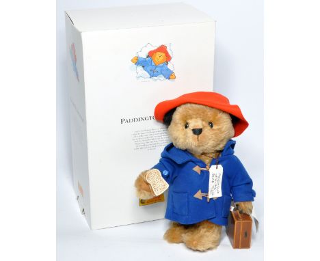 Steiff Paddington Bear 354250 Limited Edition 4074 of 5000 pieces. Beige mohair, blue duffle coat with hood and red woollen f