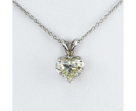 Vintage Approx. 2.22 Carat Heart Shape Diamond and 14 Karat White Gold Solitaire Pendant Necklace. Diamond J-K color, VS2 cla