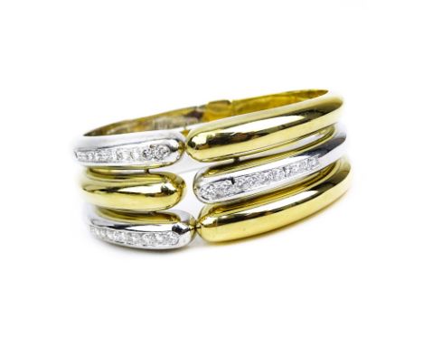 Vintage Approx. 2.45 Carat Round Brilliant Cut Diamond and Heavy 18 Karat Yellow and White Gold Hinged Cuff Bangle. Stamped 7