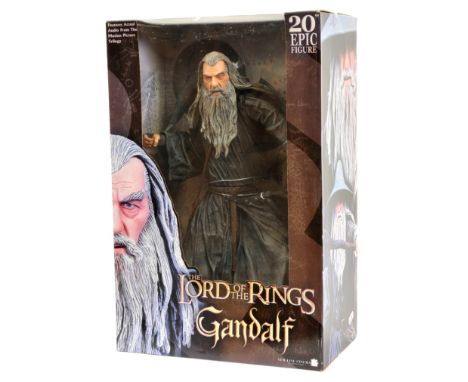 Neca Reel Toys The Lord of the Rings Gandalf 20" Epic figure, within Good Plus sealed packaging. See photo.&nbsp;