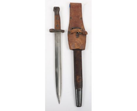 British Lee Metford Bayonet, regulation blade stamped with VR mark, regulation hilt with N.V.C impressed to one wooden grip, 