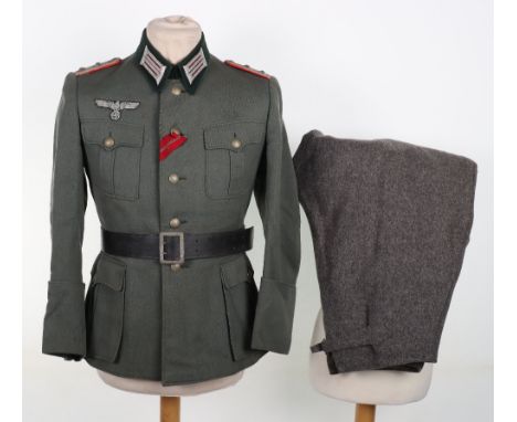WW2 German Artillery Officers Uniform Group, finely tailored four pocket officers combat tunic with bullion embroidered offic