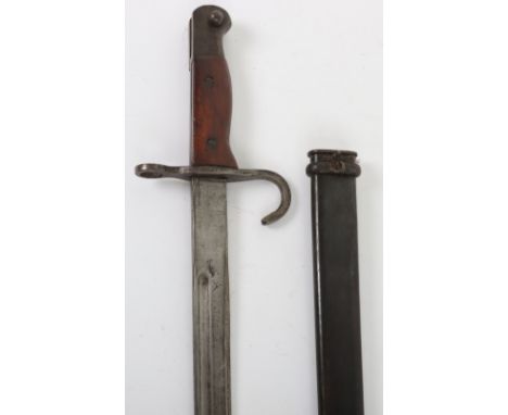 Japanese Type 30 Arisaka Training Bayonet, fine example with two piece wooden grips, one side stamped with characters. Down t