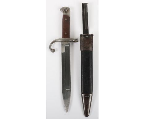 US Model 1895 Navy Lee Bayonet, with two piece wooden grips, steel pommel, cross guard with downturned quillon and muzzle rin