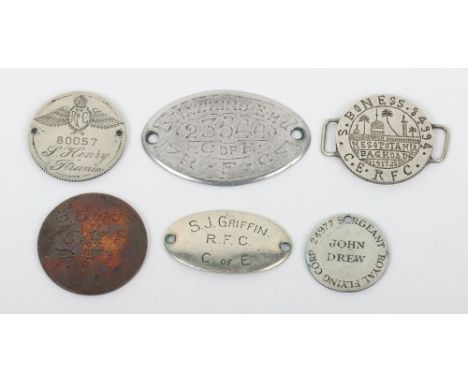 Identity Discs of the Royal Flying Corps, all being privately made examples of various qualities, many made from coins. Discs