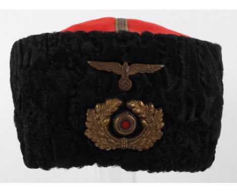 * German Army Don Cossack Papakha Headdress, field grey cloth body headdress with black wool lined exterior flaps. Red wool t
