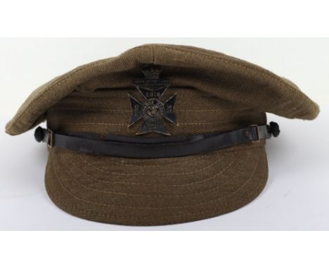 WW1 British Denim Trench Cap of the 11th County of London Regiment The Finsbury Rifles, fine example of a combat worn trench 