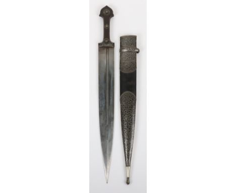 * Caucasian Dagger Kindjal Dated 1856, broad double edge blade with deep off-set fullers, signed by the maker, two piece dark