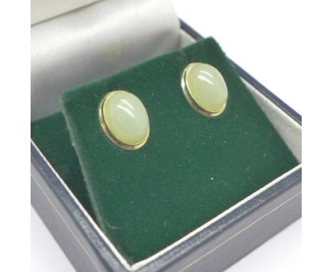 A pair of 9ct gold and jade stud earrings