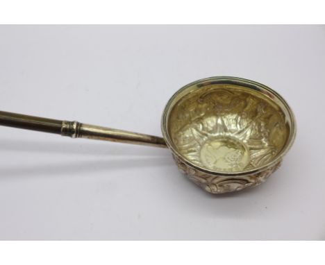 A silver toddy ladle, set with a Queen Anne coin