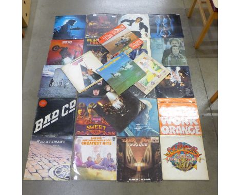 A collection of LP records including David Bowie, Bob Dylan, The Who, etc.