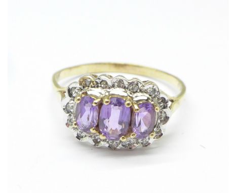 A 9ct gold, amethyst and diamond ring, 2.6g, T