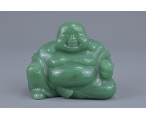 A Chinese carved green jade figure of a laughing Buddha. 10cm x 10cm&nbsp;