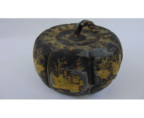 A 19th century Chinese export pewter caddy in the form of a pomegranate with gilded chinoiserie detail, 20 cm diameter
