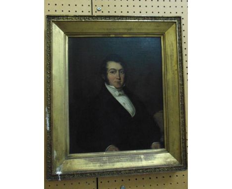 A Georgian oil on board portrait of a middle aged man, black jacket and white shirt, set within the original gilded frame, 41