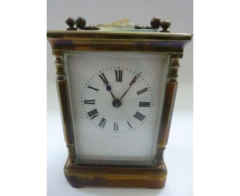 A late 19th century brass carriage clock with 8 day timepiece