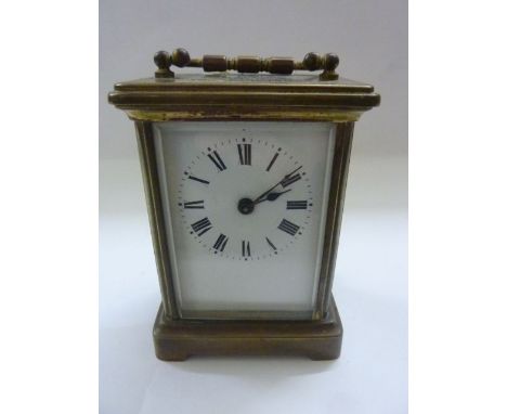 A 19th century brass cased carriage clock with 8 day time piece