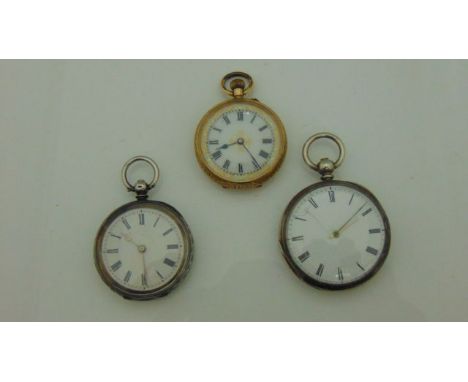 A 14k ladies fob watch with engine turned casework and opalescent dial together with two further 19th century silver cased fo