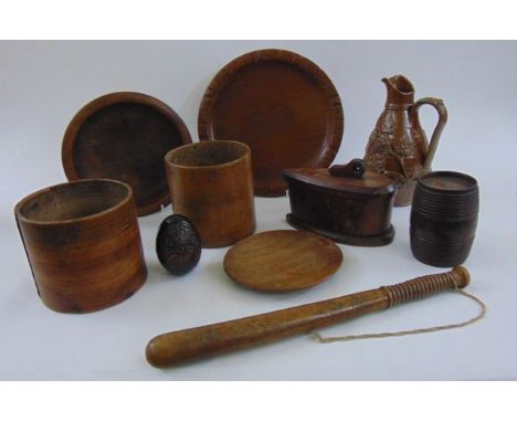 Two half gallon bushel measures, a treen barrel, a truncheon, a 19th century salt glazed jug with reeded handle over laid wit